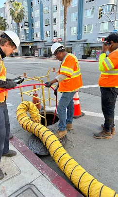 Bert's Mega Plumbing hydrojet equipment scouring a sewer line at a Los Angeles commercial kitchen